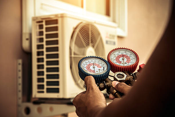 Professional Air Conditioning Service technician working in Newport, NJ